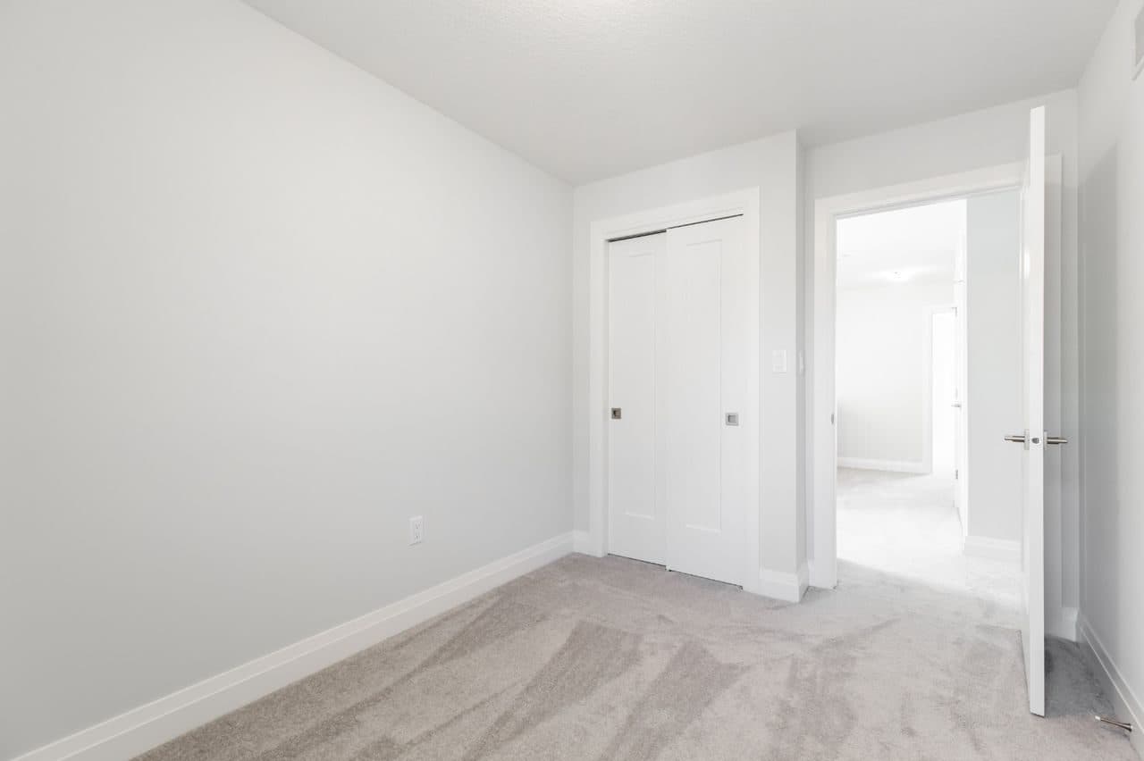 Secondary Bedroom with Neutral Decor at Private Room in Shared Townhouse – 23 Bayberry Lane, Hamilton, a 4 bedroom rental in 23 BayBerry Lane, Hamilton, ON, listed for $800 per month