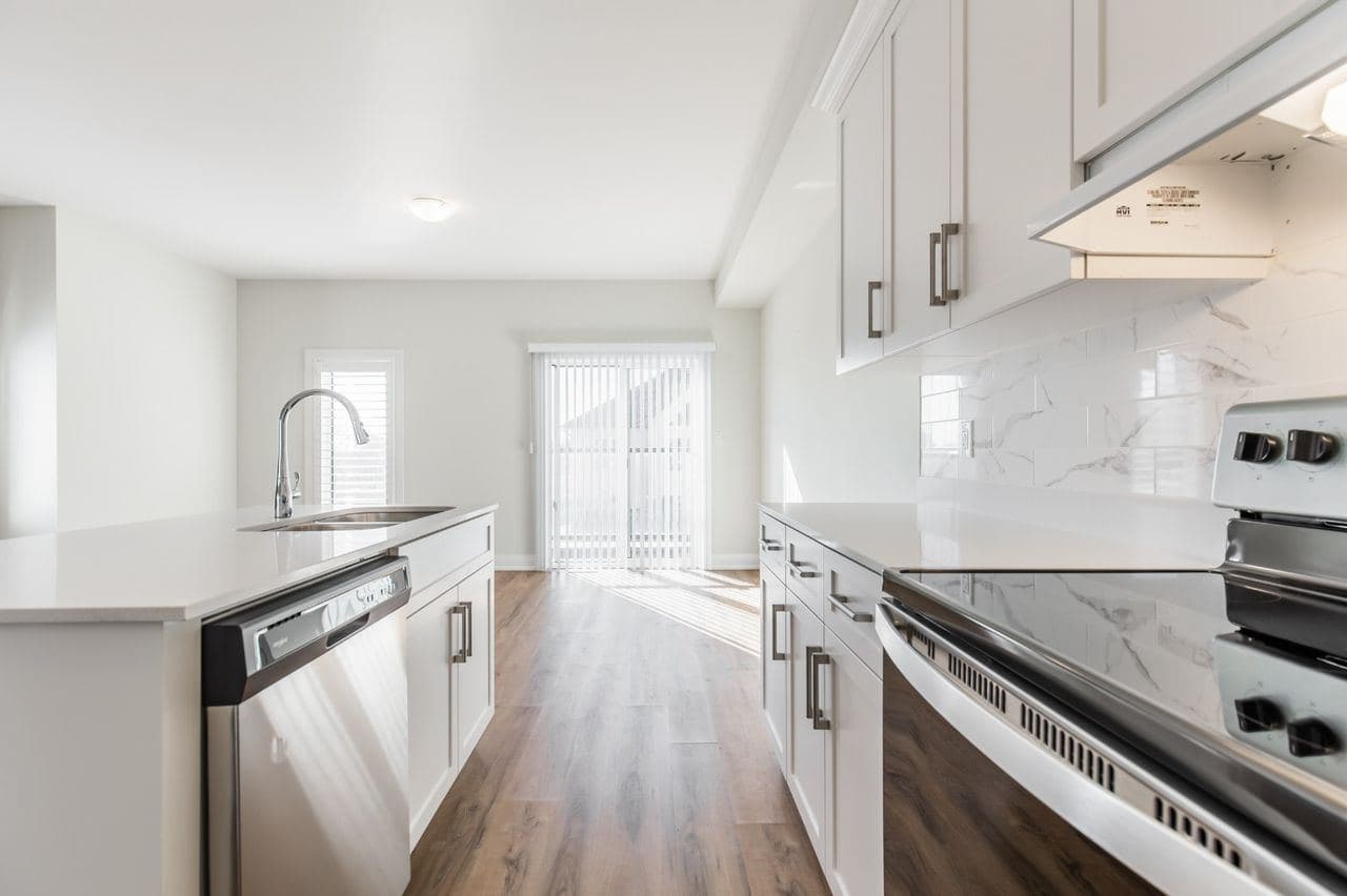 Modern Kitchen with Stainless Appliances at 1 Bedroom Townhouse for $1,200, a 1 bedroom rental in 23 BayBerry Lane, Hamilton, ON, listed for $1,200 per month