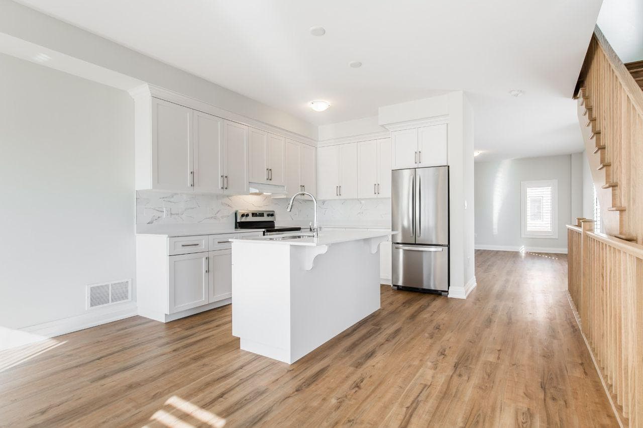 Modern Kitchen with Stainless Steel Appliances at 1 Bedroom Townhouse for $1,200, a 1 bedroom rental in 23 BayBerry Lane, Hamilton, ON, listed for $1,200 per month