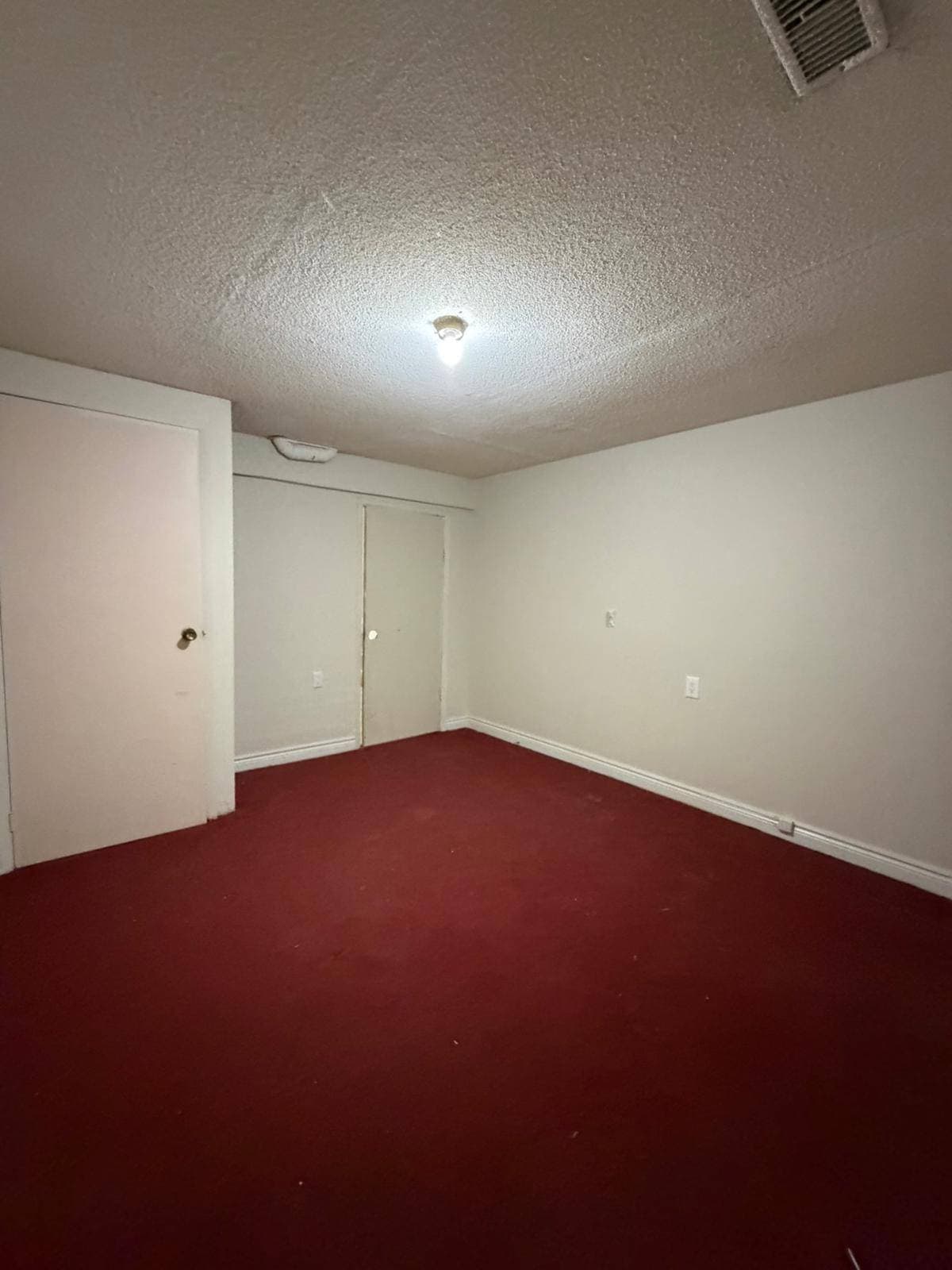 Unused Room with Red Carpet at 3 bedroom Walk out basment, a 3 bedroom rental in 151 Morton Way, Brampton, ON, listed for $2,000 per month