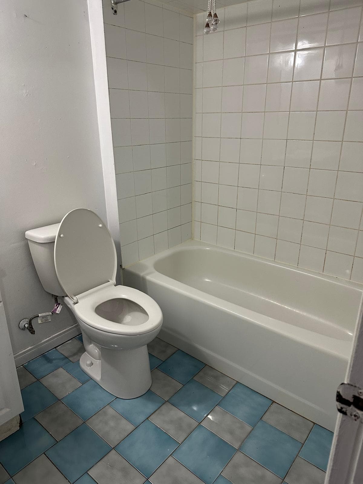 Bathroom with Tub and Toilet at 3 bedroom Walk out basment, a 3 bedroom rental in 151 Morton Way, Brampton, ON, listed for $2,000 per month